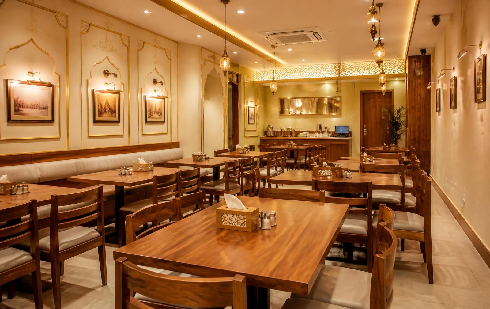 Air-conditioned dining room with warm wooden tables